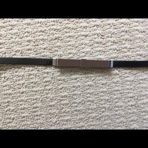 Black belt with metal bow